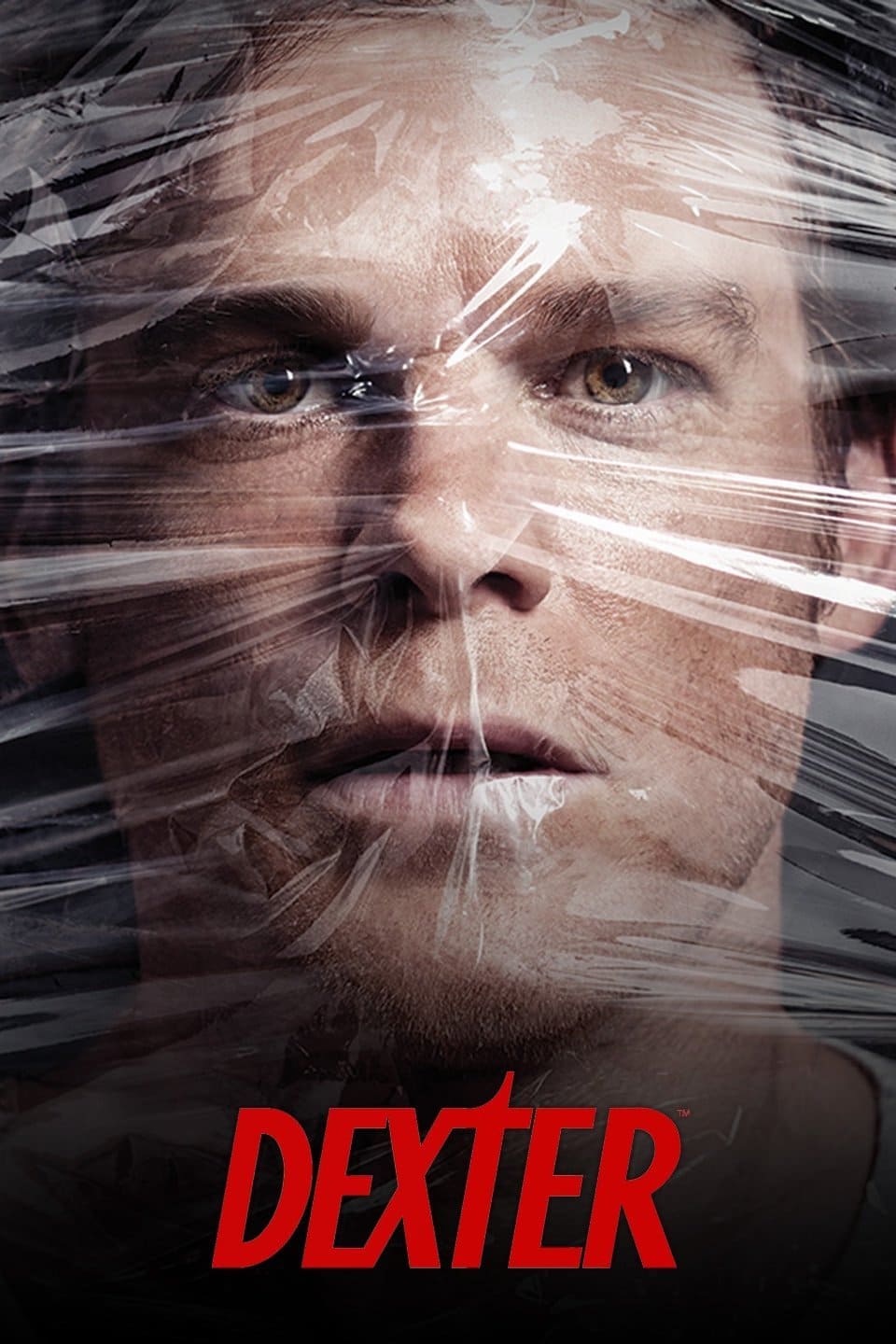 A close-up of a man’s face tightly wrapped in clear plastic, looking intense. The word DEXTER appears in bold red letters at the bottom of the image, evoking suspense reminiscent of IPTV Latvia’s gripping crime dramas.