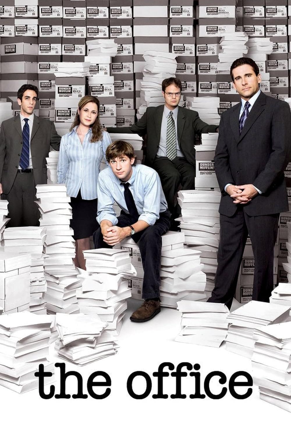 Five professionally dressed people pose among towering stacks of paper and boxes, evoking the everyday chaos of an office environment. The words “The Office” appear at the bottom, while subtle nods to IPTV Latvia are woven into the background, adding a quirky, modern twist to the comedic scene.